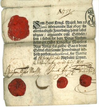 Seddel fra 1695 Møhlen-seddel på 50 riksdaler. Samlerhuset er opptatt av slike emner.