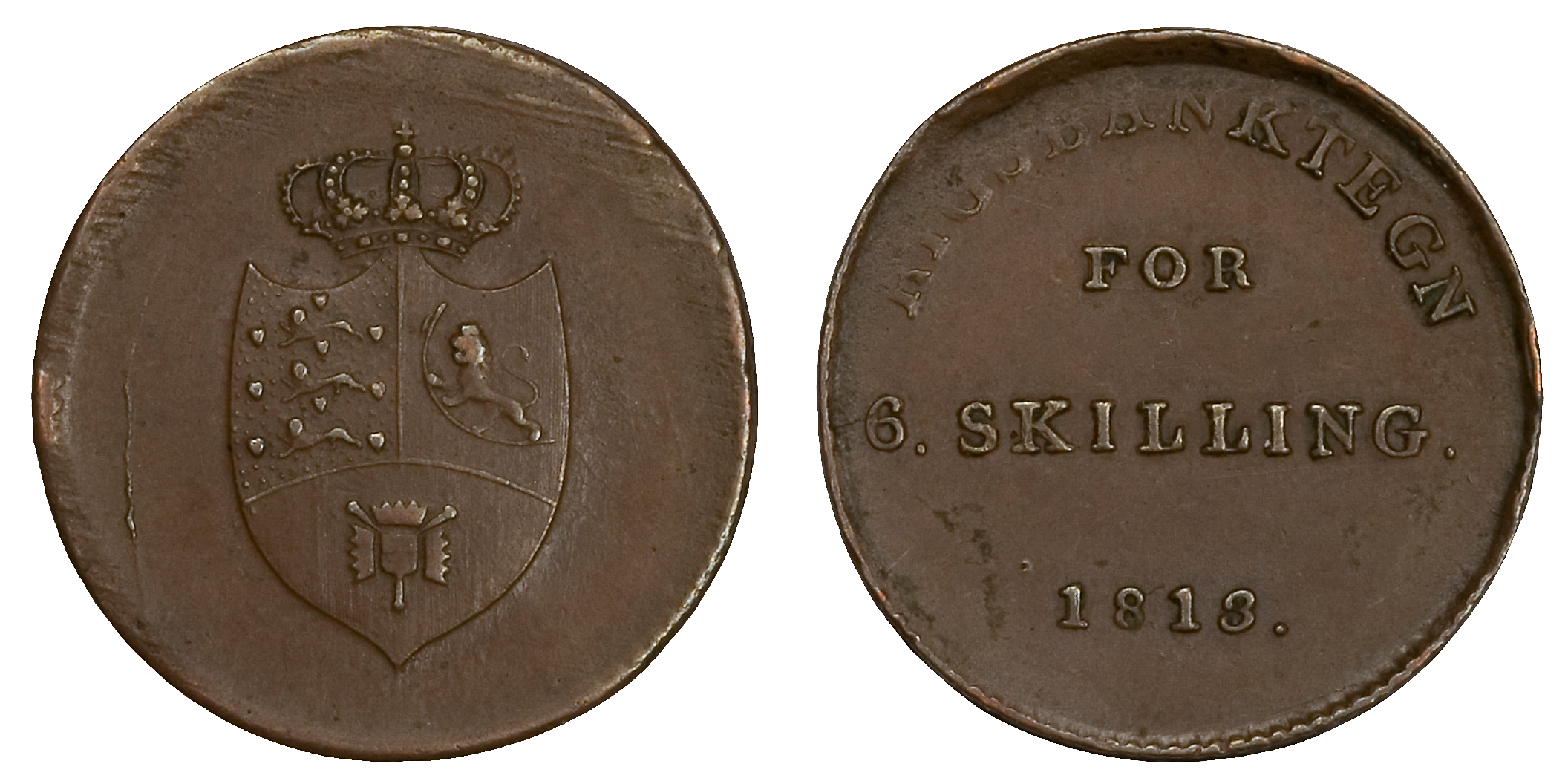 Riksbankstegn for 6. skilling. 1813. Denne mynten er preget i Danmark, og har en interessant historie verd å få med seg.